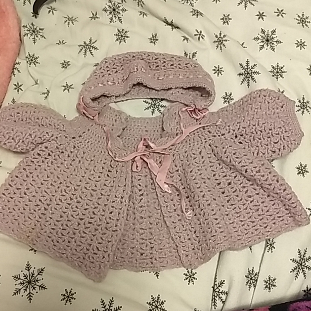 Crocheted cape and bonnet